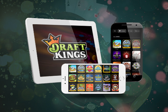 DraftKings logo and platform displayed on a tablet and two smart phones.