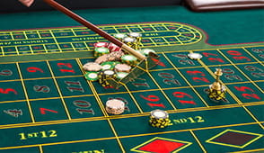 Preview of an image of bets being placed on a roulette table.